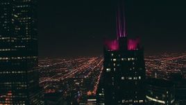 HD stock footage aerial video of the Franklin Center rooftop at night, reveal Willis Tower skyscraper, Downtown Chicago, Illinois Aerial Stock Footage | ED0001_000062