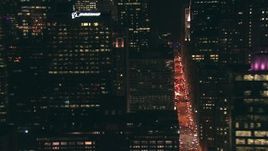HD stock footage aerial video flyby city streets and skyscrapers at nighttime in Downtown Chicago, Illinois Aerial Stock Footage | ED0001_000065
