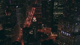 HD stock footage aerial video follow Chicago River past Trump Tower skyscraper at night, Downtown Chicago, Illinois Aerial Stock Footage | ED0001_000081