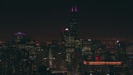 HD stock footage aerial video of Willis Tower and city skyscrapers at night, Downtown Chicago, Illinois Aerial Stock Footage | ED0001_000084