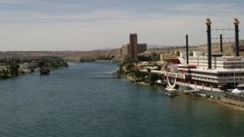 4K aerial stock footage of passing resort casinos on the Colorado River in Laughlin, Nevada Aerial Stock Footage | FG0001_000005