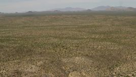 4K aerial stock footage of wide Mojave Desert landscape in San Bernardino County, California Aerial Stock Footage | FG0001_000038