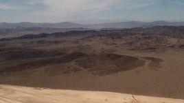 4K aerial stock footage of rugged Mojave Desert mountains in San Bernardino County, California Aerial Stock Footage | FG0001_000065
