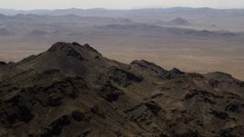 4K aerial stock footage of a rugged Mojave Desert mountain in San Bernardino County, California Aerial Stock Footage | FG0001_000084