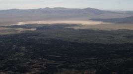 4K aerial stock footage pan across the lava fields of the Pisgah Crater in the Mojave Desert, San Bernardino County, California Aerial Stock Footage | FG0001_000089