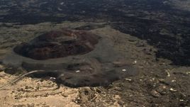 4K aerial stock footage fly away from the Pisgah Crater cinder cone and lava field in the Mojave Desert, San Bernardino County, California Aerial Stock Footage | FG0001_000094