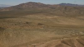 4K aerial stock footage pan across the Rodman Mountains and desert plain in the Mojave Desert, San Bernardino County, California Aerial Stock Footage | FG0001_000102