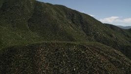 4K aerial stock footage approach steep green mountain slopes in the San Gabriel Mountains, California Aerial Stock Footage | FG0001_000158