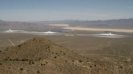 4K aerial stock footage of the three towers and arrays of the Ivanpah Solar Electric Generating System, California Aerial Stock Footage | FG0001_000166
