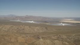 4K aerial stock footage tilt from blue skies to reveal the Ivanpah Solar Electric Generating System, California Aerial Stock Footage | FG0001_000167