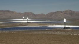 4K aerial stock footage of a view of the three arrays at the Ivanpah Solar Electric Generating System in California Aerial Stock Footage | FG0001_000177
