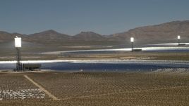 4K aerial stock footage of row of power towers and mirrors of the Ivanpah Solar Electric Generating System in California Aerial Stock Footage | FG0001_000180