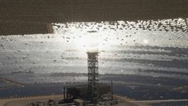 4K aerial stock footage zoom tighter to a clope-up of a power tower boiler at the Ivanpah Solar Electric Generating System in California Aerial Stock Footage | FG0001_000204