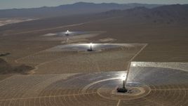 4K aerial stock footage of a view of the three solar power structures at the Ivanpah Solar Electric Generating System in California Aerial Stock Footage | FG0001_000210