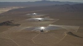 4K aerial stock footage tilt to reveal the solar power structures at the Ivanpah Solar Electric Generating System in California Aerial Stock Footage | FG0001_000212