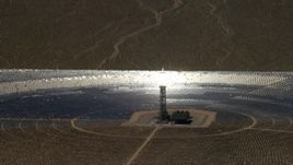 4K aerial stock footage zoom to a mirror array and power tower at the Ivanpah Solar Electric Generating System in California Aerial Stock Footage | FG0001_000223