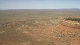 4K aerial stock footage approach a dry riverbed running through the Arizona Desert Aerial Stock Footage | FG0001_000227