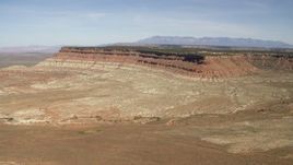 4K aerial stock footage of a mesa seen across a desert plain in the Arizona Desert Aerial Stock Footage | FG0001_000229