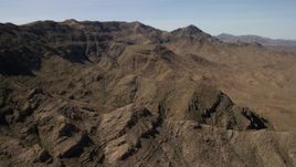 4K aerial stock footage flyby a rocky mountain ridge in the Nevada Desert Aerial Stock Footage | FG0001_000257