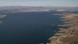 4K aerial stock footage of a view across Lake Mead, seen from the desert shore in Nevada Aerial Stock Footage | FG0001_000276