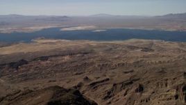 4K aerial stock footage flyby Lake Mead, seen from the rugged desert in Nevada Aerial Stock Footage | FG0001_000281