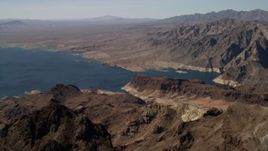 4K aerial stock footage flyby barren mountains on the shore of Lake Mead, Nevada Aerial Stock Footage | FG0001_000287