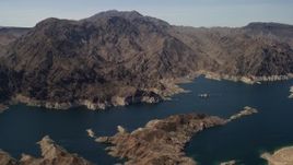 4K aerial stock footage of a view of tall desert mountains on the opposite shore of Lake Mead, Nevada Aerial Stock Footage | FG0001_000296