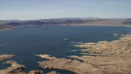 4K aerial stock footage of a view across Lake Mead ringed by Nevada desert Aerial Stock Footage | FG0001_000298