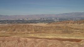 4K aerial stock footage fly over barren desert mountains to approach Las Vegas, Nevada Aerial Stock Footage | FG0001_000302