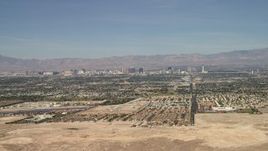 4K aerial stock footage approach suburban neighborhoods with the casino hotels in the background, Las Vegas, Nevada Aerial Stock Footage | FG0001_000307