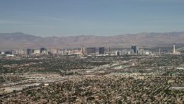 4K aerial stock footage of Las Vegas hotels and casinos seen from suburban neighborhoods, Nevada Aerial Stock Footage | FG0001_000310