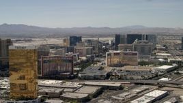 4K aerial stock footage of Las Vegas Strip resort casinos seen while passing Treasure Island and The Mirage in Nevada Aerial Stock Footage | FG0001_000323