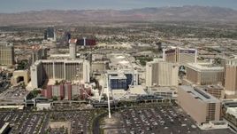 4K aerial stock footage flyby the High Roller Ferris wheel and casino resorts on the Las Vegas Strip, Nevada Aerial Stock Footage | FG0001_000337