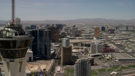 4K aerial stock footage flyby the top of Stratosphere Las Vegas, Nevada, and focus on casino resorts on the Las Vegas Strip Aerial Stock Footage | FG0001_000342
