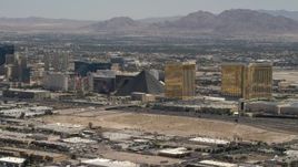 4K aerial stock footage of Las Vegas Strip casino resort hotels across I-15 from an open dirt lot in Las Vegas, Nevada Aerial Stock Footage | FG0001_000354