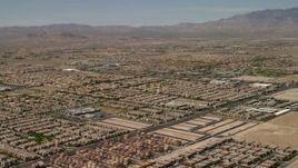 4K aerial stock footage fly over neighborhoods with tract homes and approach an elementary school in Las Vegas, Nevada Aerial Stock Footage | FG0001_000356