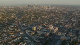 HD stock footage aerial video approach Children's Hospital Los Angeles and Downtown Los Angeles at sunset, California Aerial Stock Footage | HDA06_12