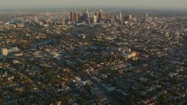 HD stock footage aerial video Downtown Los Angeles skyscrapers at sunset seen from Echo Lake in Echo Park, California Aerial Stock Footage | HDA06_15