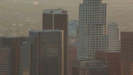 HD stock footage aerial video tops of skyscrapers at sunset in Downtown Los Angeles, California Aerial Stock Footage | HDA06_21