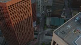 HD stock footage aerial video bird's eye view of S Hope Street through Downtown Los Angeles at sunset, California Aerial Stock Footage | HDA06_32