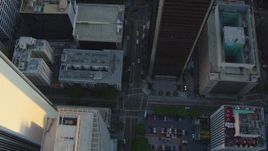 HD stock footage aerial video bird's eye view of S Hope Street through Downtown Los Angeles, California at sunset Aerial Stock Footage | HDA06_34