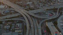 HD stock footage aerial video the interchange of 110 and 10 with light traffic at sunset in Downtown Los Angeles, California Aerial Stock Footage | HDA06_36