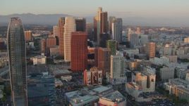 HD stock footage aerial video flyby skyscrapers at sunset in Downtown Los Angeles, California to reveal The Ritz-Carlton Aerial Stock Footage | HDA06_46