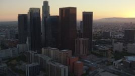 HD stock footage aerial video approach the Downtown Los Angeles skyline at sunset, California Aerial Stock Footage | HDA06_56