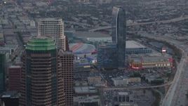 HD stock footage aerial video flyby skyscrapers in Downtown Los Angeles at twilight to reveal Staples Center and Ritz-Carlton in California Aerial Stock Footage | HDA06_63