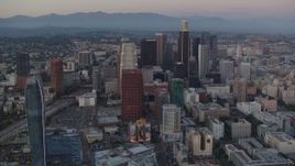 HD stock footage aerial video tilt from Staples Center and Nokia Theater to reveal Downtown Los Angeles, California, twilight Aerial Stock Footage | HDA06_66