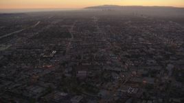 HD stock footage aerial video Los Angeles urban neighborhoods at twilight, California Aerial Stock Footage | HDA06_79
