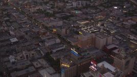 HD stock footage aerial video fly over office buildings and W Hotel near Capitol Records to follow Hollywood Boulevard at twilight, Hollywood, California Aerial Stock Footage | HDA06_82