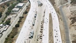 HD stock footage aerial video of following traffic as it merges on Newhall Pass, Santa Clarita, California Aerial Stock Footage | HDA07_31