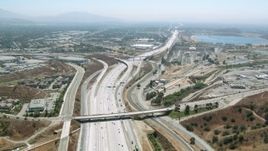 HD stock footage aerial video of following 5 freeway to reservoir in Granada Hills, California Aerial Stock Footage | HDA07_32